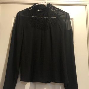 Women’s black express shirt